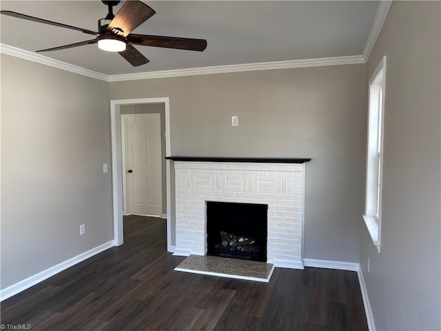 unfurnished living room with ceiling fan, ornamental molding, dark hardwood / wood-style floors, and a brick fireplace