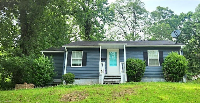 view of front of home with a front yard