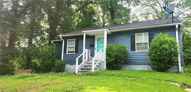 view of front of home with a front lawn