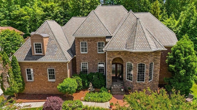 view of front of home with brick siding