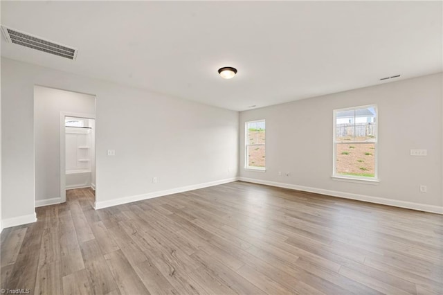 5757 Siler St, Trinity, NC 27370 - unfurnished room featuring baseboards, wood finished floors, and visible vents