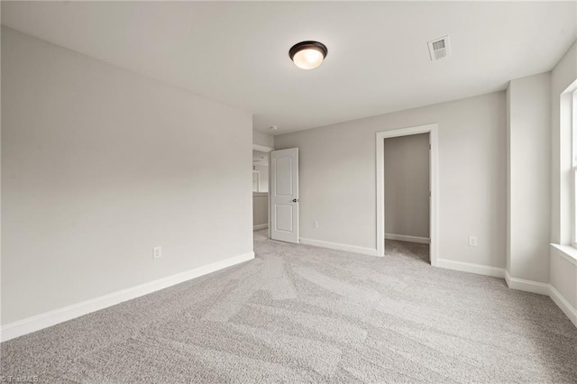 5757 Siler St, Trinity, NC 27370 - spare room featuring baseboards, visible vents, and light carpet