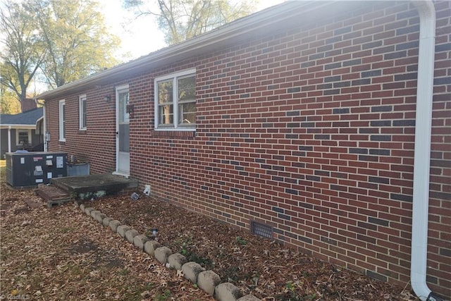 view of home's exterior with central air condition unit