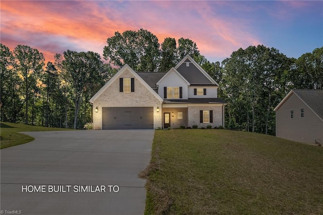 6963 Orchard Path Dr, Clemmons, NC 27012 - view of front of property with concrete driveway, a yard, and brick siding