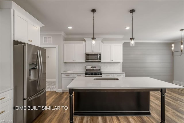 6963 Orchard Path Dr, Clemmons, NC 27012 - kitchen with stainless steel appliances, crown molding, baseboards, light countertops, and recessed lighting