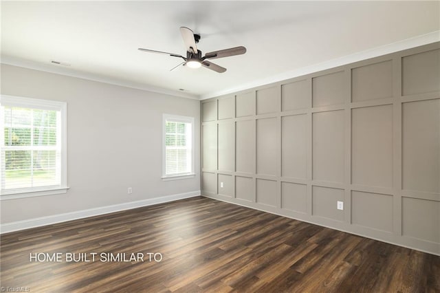 6963 Orchard Path Dr, Clemmons, NC 27012 - unfurnished bedroom with a decorative wall, dark wood finished floors, ornamental molding, baseboards, and a ceiling fan