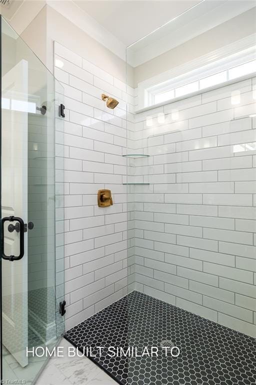 6963 Orchard Path Dr, Clemmons, NC 27012 - bathroom with a stall shower and marble look tiles