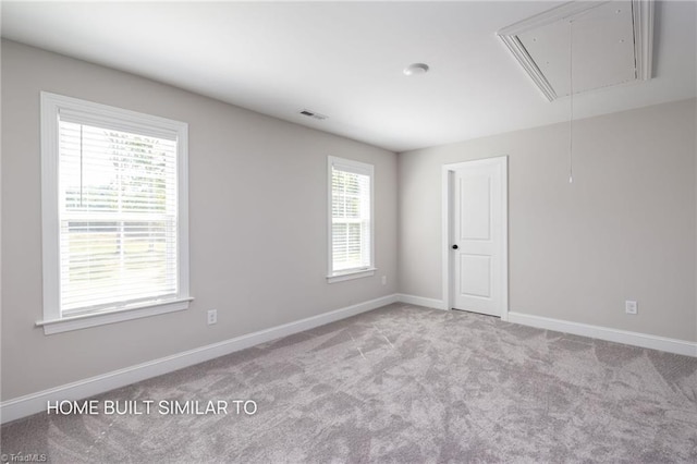 6963 Orchard Path Dr, Clemmons, NC 27012 - carpeted empty room featuring attic access, healthy amount of natural light, and baseboards