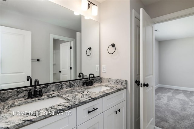 6963 Orchard Path Dr, Clemmons, NC 27012 - full bath with double vanity and baseboards