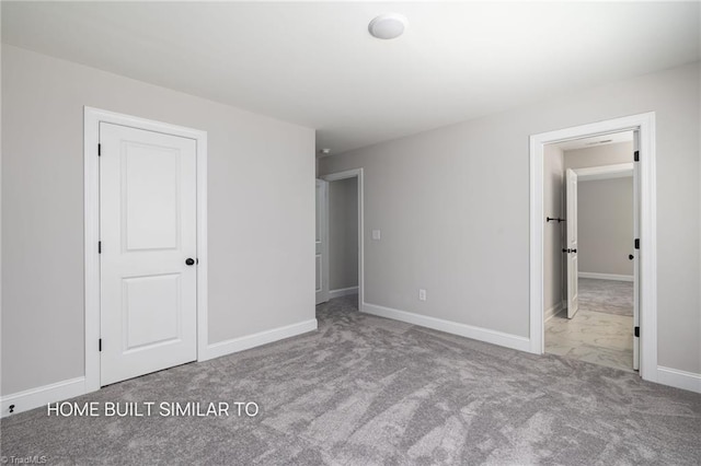 6963 Orchard Path Dr, Clemmons, NC 27012 - unfurnished bedroom with carpet floors and baseboards