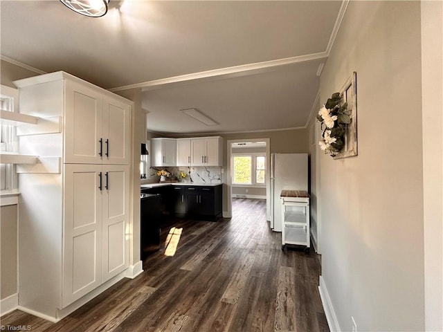 kitchen with ornamental molding, open shelves, dark wood-style floors, white cabinetry, and light countertops