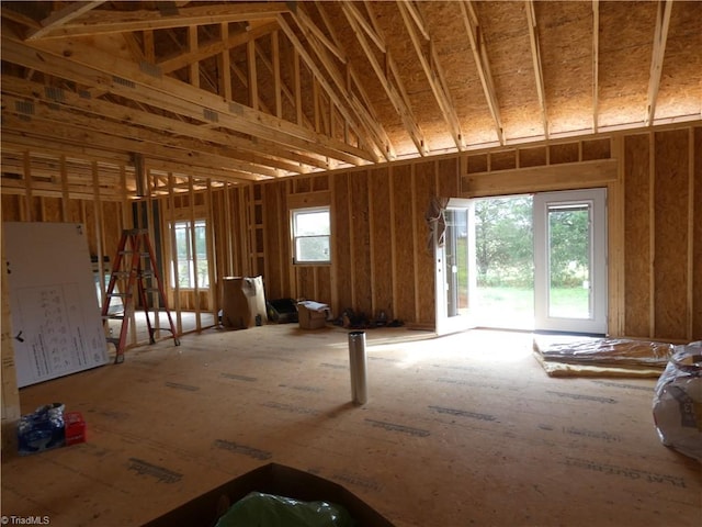 misc room featuring high vaulted ceiling and plenty of natural light