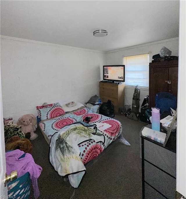 carpeted bedroom featuring ornamental molding