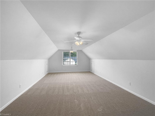 615 Walnut Crossing Dr, Whitsett, NC 27377 - bonus room with vaulted ceiling, ceiling fan, carpet flooring, and baseboards