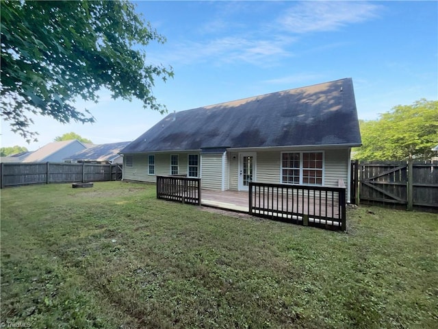 615 Walnut Crossing Dr, Whitsett, NC 27377 - rear view of house with a wooden deck