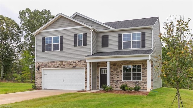 craftsman-style home with a front yard and a garage