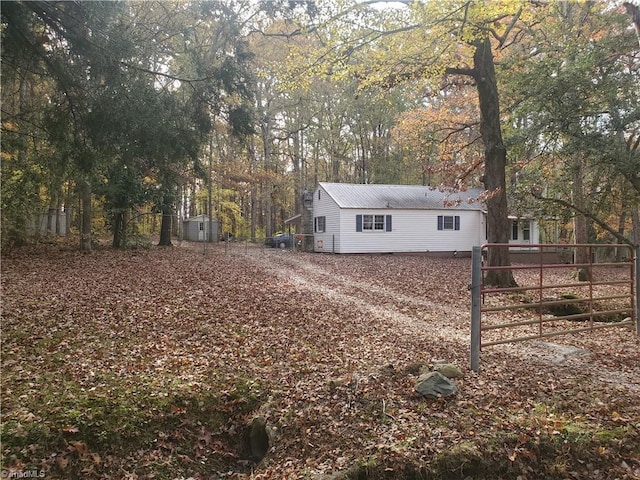 291 Virgil Hill Rd, Asheboro, NC 27205 - view of home's exterior featuring metal roof