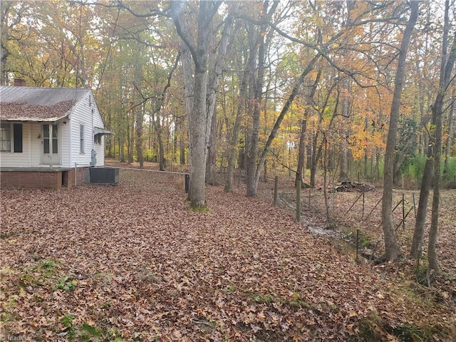 view of yard featuring central AC