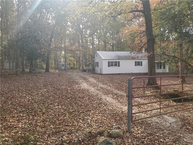 291 Virgil Hill Rd, Asheboro, NC 27205 - view of side of property with metal roof