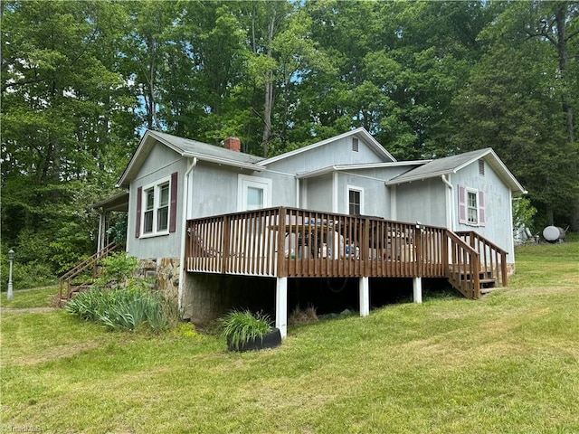 4679 S NC Highway 18, Moravian Falls, NC 28654 - back of property featuring a wooden deck, a yard, and a chimney