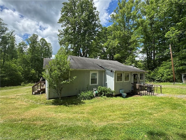 4679 S NC Highway 18, Moravian Falls, NC 28654 - rear view of house featuring a lawn