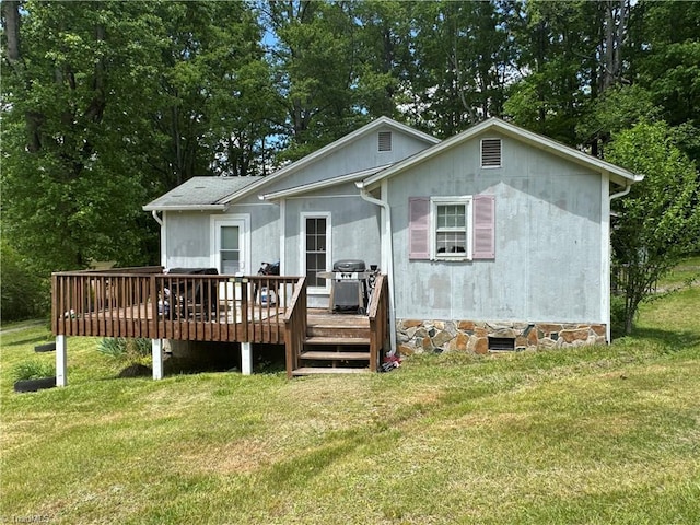 4679 S NC Highway 18, Moravian Falls, NC 28654 - rear view of property with a deck, a lawn, and crawl space