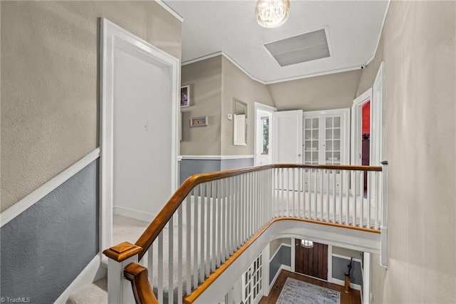 staircase featuring vaulted ceiling