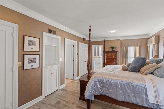 bedroom with light hardwood / wood-style flooring and ornamental molding