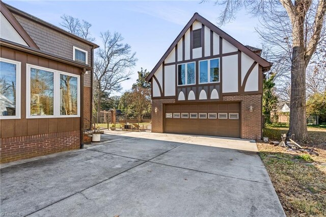 view of side of property featuring a garage