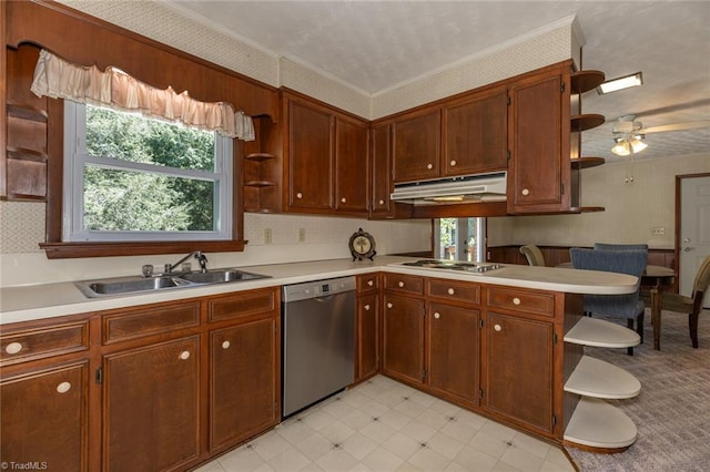 kitchen with appliances with stainless steel finishes, plenty of natural light, light tile patterned floors, and ceiling fan