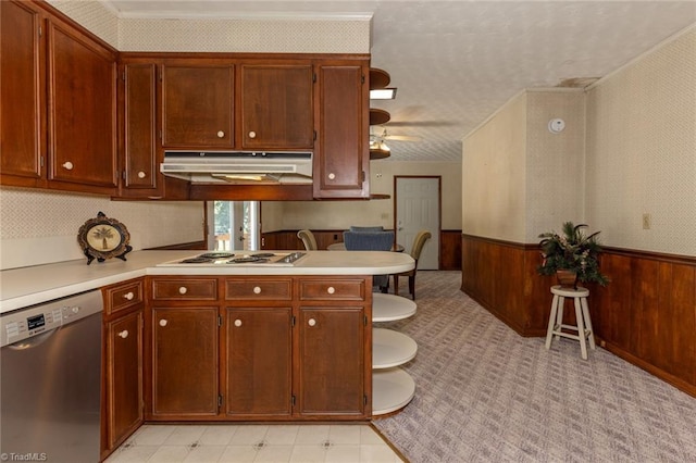 kitchen featuring light tile patterned floors, dishwasher, kitchen peninsula, ceiling fan, and white gas cooktop