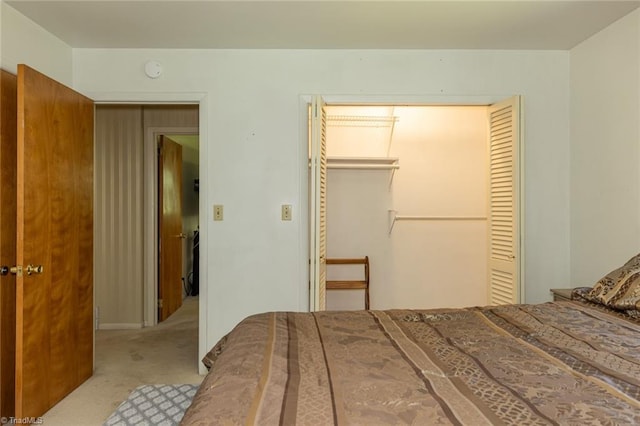 carpeted bedroom featuring a closet