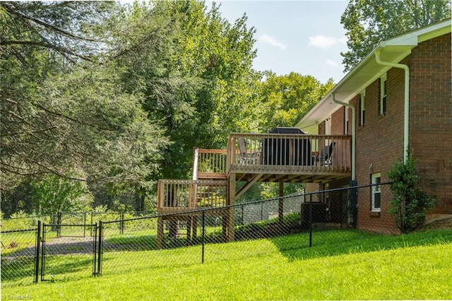 view of yard with a wooden deck