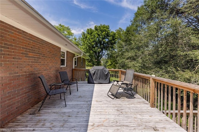 deck featuring grilling area