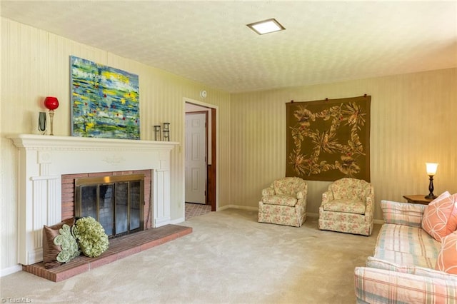 carpeted living room featuring a fireplace