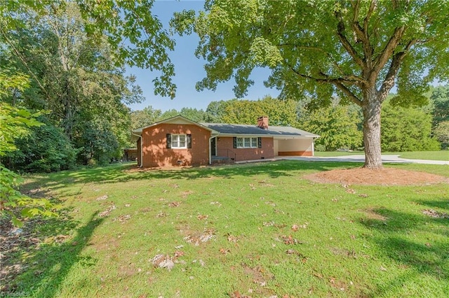 ranch-style home with a front lawn