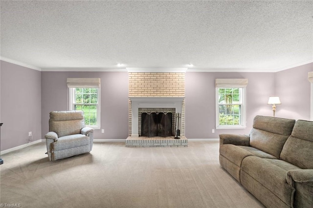 living area featuring ornamental molding, a textured ceiling, light colored carpet, a brick fireplace, and baseboards