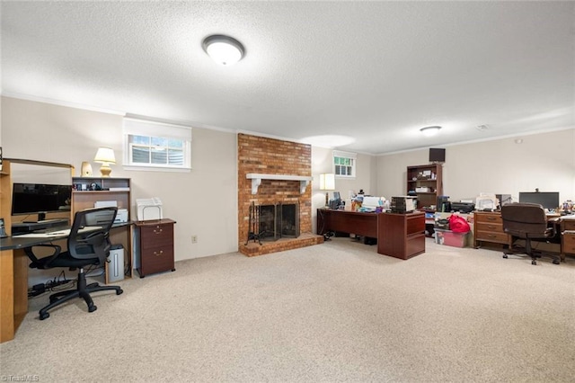 office space featuring a brick fireplace, carpet, crown molding, and a textured ceiling