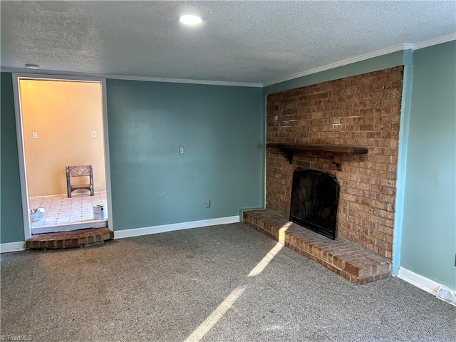 unfurnished living room featuring carpet, ornamental molding, a textured ceiling, and a brick fireplace