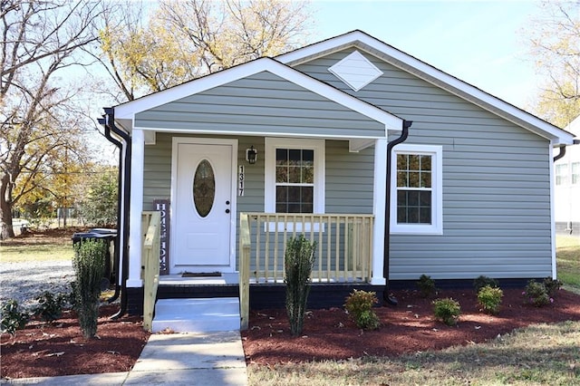 bungalow-style home with a porch