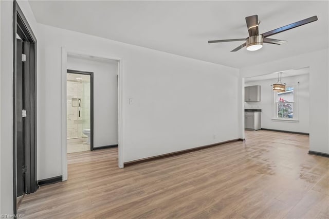 unfurnished living room featuring ceiling fan and light hardwood / wood-style flooring