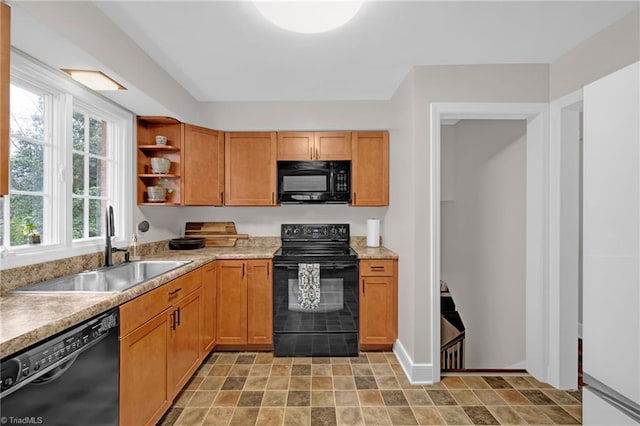 kitchen with sink and black appliances