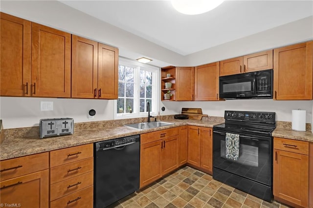 kitchen featuring black appliances and sink