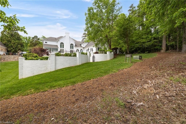view of yard with a fenced front yard