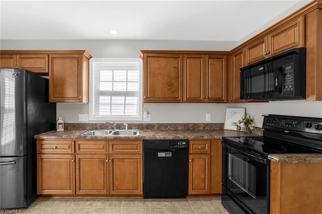 kitchen featuring sink and black appliances