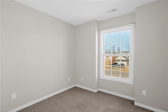 view of carpeted spare room