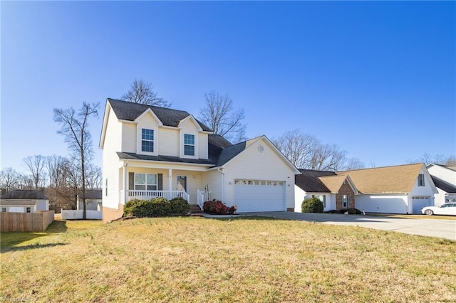 front facade with a garage, a front yard, and a porch