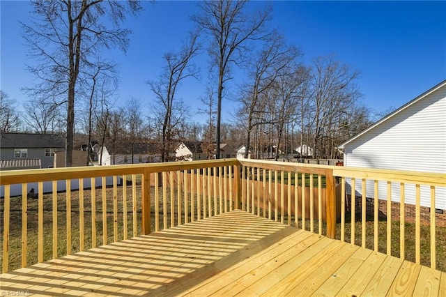 deck featuring a lawn