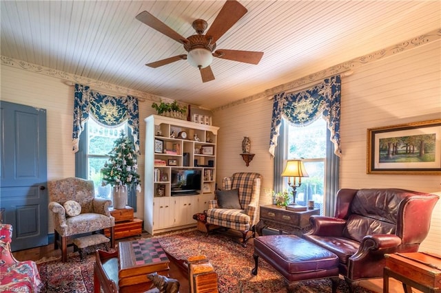 living room featuring wood ceiling, hardwood / wood-style floors, and ceiling fan