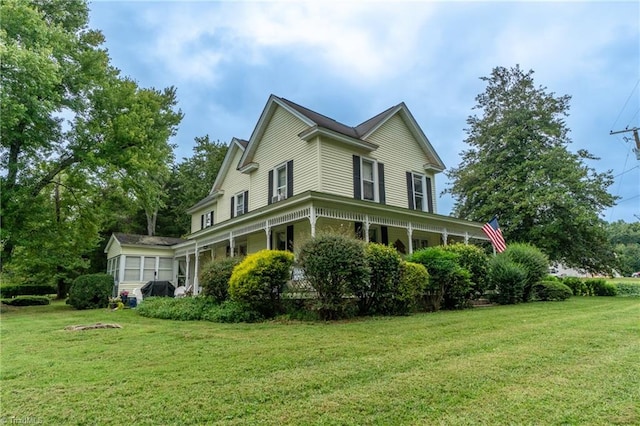 view of property exterior featuring a lawn